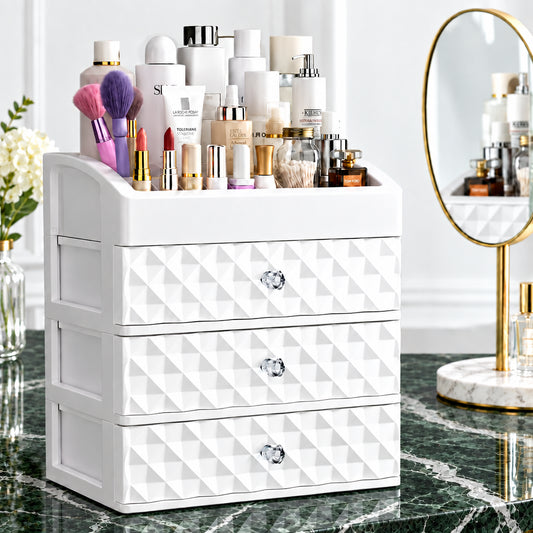 White three-drawer cosmetic and makeup organizer with open top storage on a vanity table