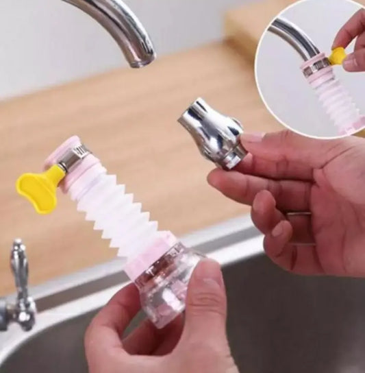 Flexible faucet spray extender being attached to a curved faucet spout
