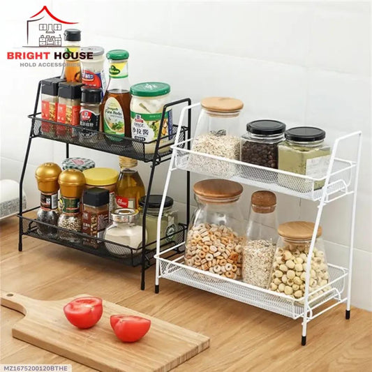 2-tier metal spice and grain rack used on a kitchen countertop