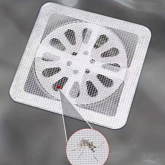 Adhesive mesh drain filter catching hair around a bathroom drain