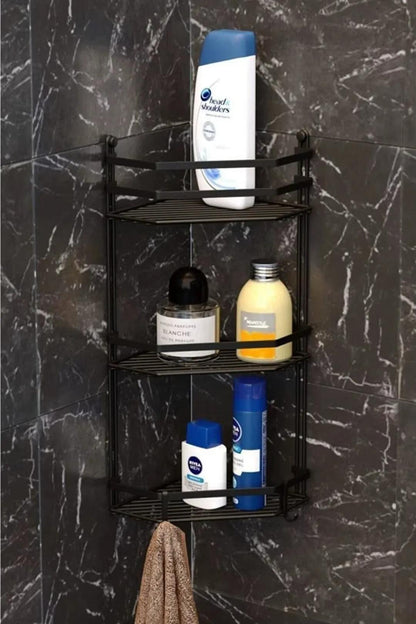 Black 3-tier corner bathroom shelf installed with toiletries and towel