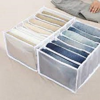 Two 7-grid wardrobe organizers storing folded clothes