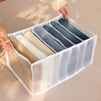 7-grid wardrobe organizer holding folded jeans and trousers