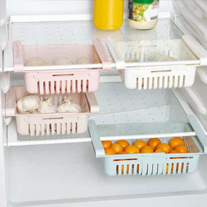 Adjustable hanging fridge basket organizer installed under refrigerator shelves