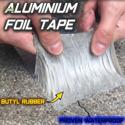 Close-up of thick butyl rubber adhesive layer on aluminum foil waterproof tape