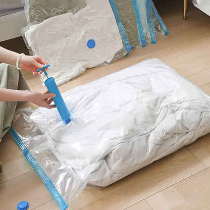 Vacuum storage bag being compressed with a blue hand pump for bedding storage