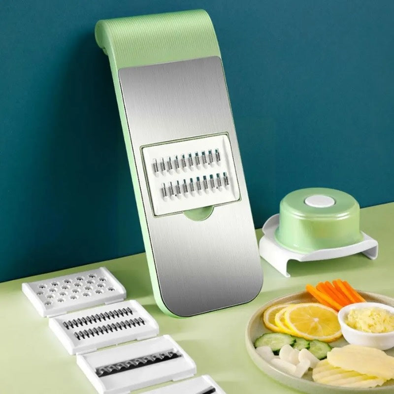 Vegetable slicer and grater with interchangeable blade attachments